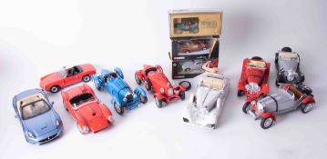 A collection of Burago scale model Italian cars, also Mattel Sun Star and models, two James Bond