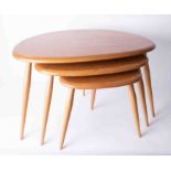 A nest of three Ercol lightwood 'pebble' tables.