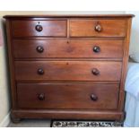 An early 20th Century mahogany straight front chest of drawers fitted with five drawers.