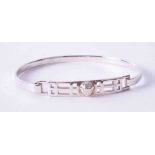 A Rennie Mackintosh design silver bangle, boxed, approx. 12.40g.