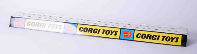 Corgi Toys tin shop display stand, length 77cm.