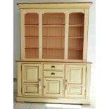 A modern French two part dresser painted in cream, width 167cm, overall height 218cm, upper