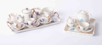 A WH Goss miniature tea set together with a Continental miniature porcelain tea set, each with