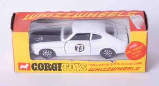 Corgi Toys 303 Whizzwheels Roger Clarks Ford Capri, boxed.