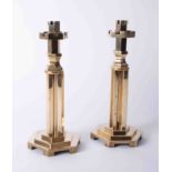 A pair of heavy brass unusual candlesticks, height 28cm.