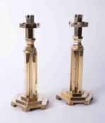 A pair of heavy brass unusual candlesticks, height 28cm.