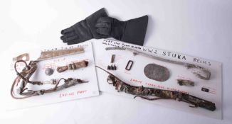 Collection WWII relics presented on two boards from air craft Stuka JU 87 engine part, shot down