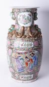 A 19/20th century Cantonese porcelain vase, richly decorated with panels of figures, insects,
