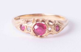 An antique 18ct yellow gold ring set three rubies and diamonds (one diamond missing), 3.3g, finger