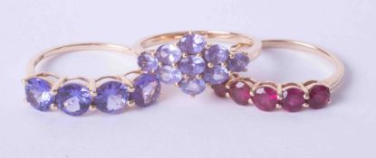 Three 9ct yellow rings to including a 9ct yellow gold 1/2 eternity style ring set purple stones,