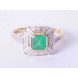 An 18ct yellow gold cluster ring of Art Deco style set approx. 0.75 carat emerald, surrounded by