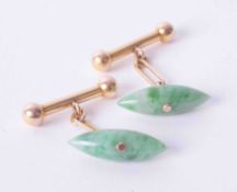A pair of 14ct yellow gold and marquise shaped jade cufflinks.