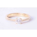 An 18ct yellow gold four claw ring set approx. 0.36 carat round brilliant cut diamond, colour F-G