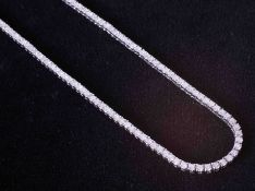 A fine 18ct white gold diamond set necklace, total diamond weight approx. 16.50 carats, 173