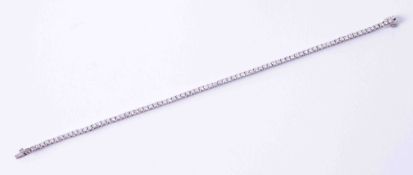 A fine 18ct white gold line bracelet set approx. 2.40 carats of diamonds, 81 in total, colour G-H