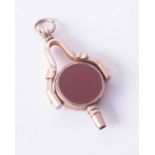 A 10ct rose gold watch key fob set bloodstone, 5.1g.