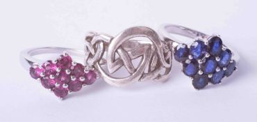 Three silver rings to include one silver Celtic design ring finger size P 1/2, silver cluster ring