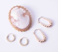 A 9ct yellow gold Cameo brooch and two pairs of 9ct yellow gold hoop earrings, total weight 12.