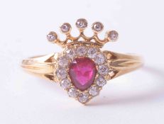 A Victorian 18ct yellow gold heart shaped Claddagh ring set oval ruby, approx. 0.35 carats