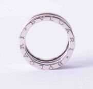 An 18ct white gold moveable wide band ring by Bvlgari, 10.5g, approx. finger size O 1/2.