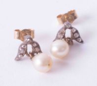 A pair of gold Edwardian cultured pearl drop earrings with small old cut diamonds, weight 1.8g.