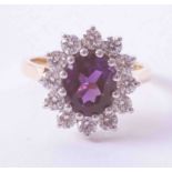 An impressive 18ct yellow & white gold cluster ring set approx. 2.33 carat of oval cut amethyst