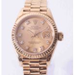 Rolex, an 18ct yellow gold ladies 1994 Oyster Perpetual Datejust diamond dot dial, box and papers,