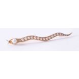 An unusual 15ct yellow gold snake brooch set seed pearls, weight 6.6g.