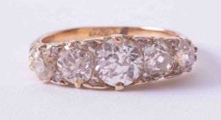 A Victorian 18ct yellow gold five stone ring set approx. 2.40 carats of old cut diamonds, finger