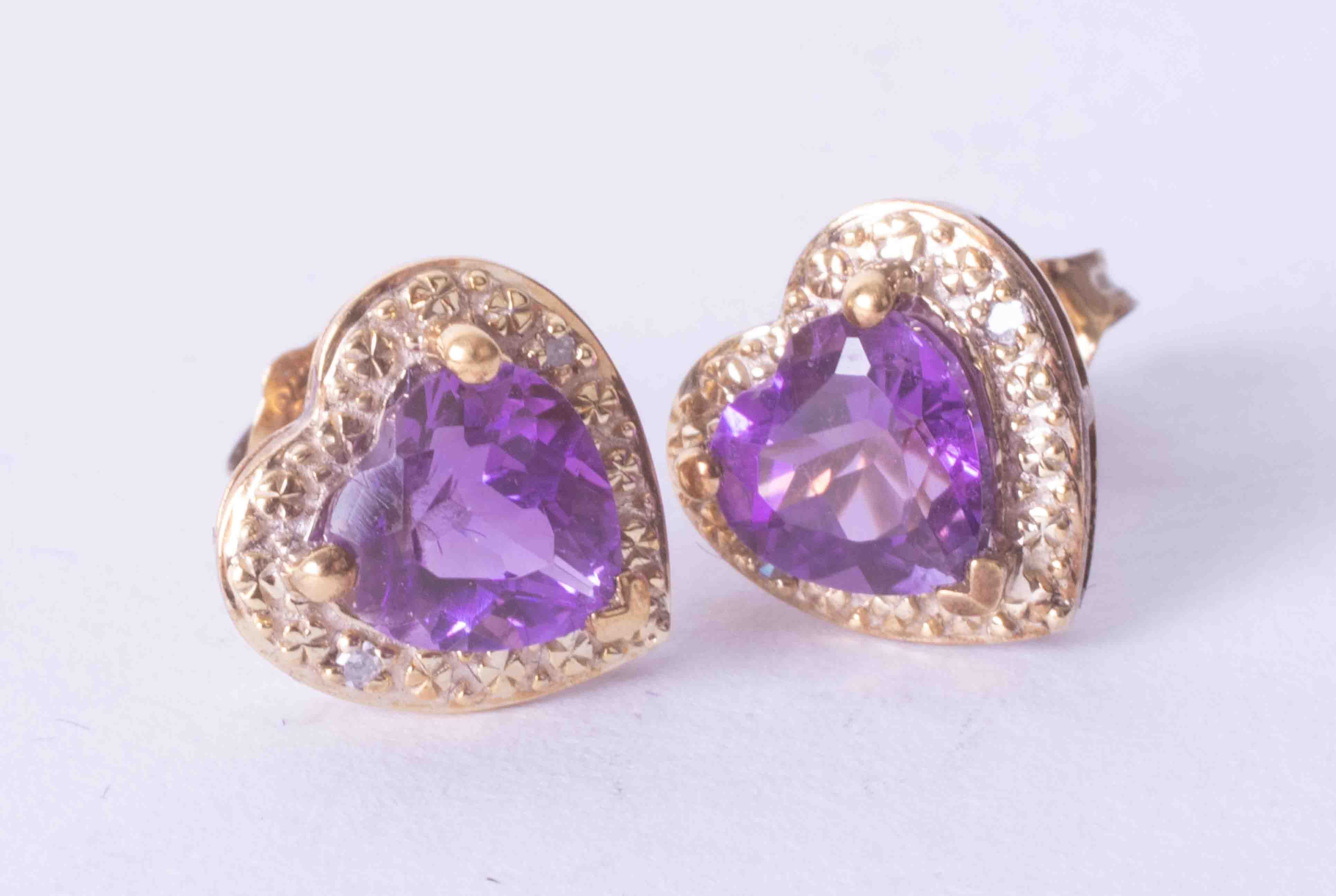 A pair 9ct yellow gold heart shaped amethyst and diamond set earrings.