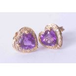 A pair 9ct yellow gold heart shaped amethyst and diamond set earrings.