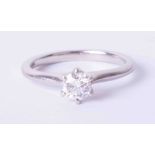 A platinum six claw solitaire ring set 0.50 carat round brilliant cut diamond, colour E, clarity VS1