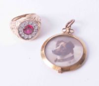 An ornate 9ct yellow gold dress ring set red & white stones and an antique 18ct yellow gold photo