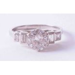 An impressive Art Deco platinum ring, set approx. 1.65 carat round cut diamond, colour G-H,