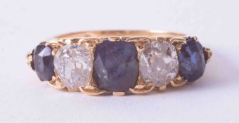 A Victorian yellow gold five stone ring set old cut diamonds & cushion cut sapphires, finger size