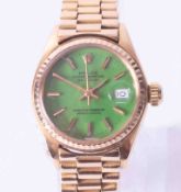 Rolex, an 18ct yellow gold Ladies Oyster Perpetual Datejust with green 'Stella' dial, 1974, with a