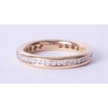 An 18ct yellow gold diamond full band eternity ring, finger size M 1/2.