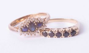 Two 9ct yellow gold gem set rings one in the style of a cluster the other a half eternity, total