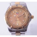 Tag Heuer, a gents steel and two-tone professional quartz wristwatch, with guarantee card