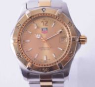 Tag Heuer, a gents steel and two-tone professional quartz wristwatch, with guarantee card