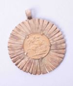 An 1884 Victoria half sovereign mounted in a 9ct yellow gold starburst style pendant mount, 17.9g