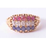 An antique 18ct yellow gold three row ring set rubies, diamonds and sapphires in a gypsy style