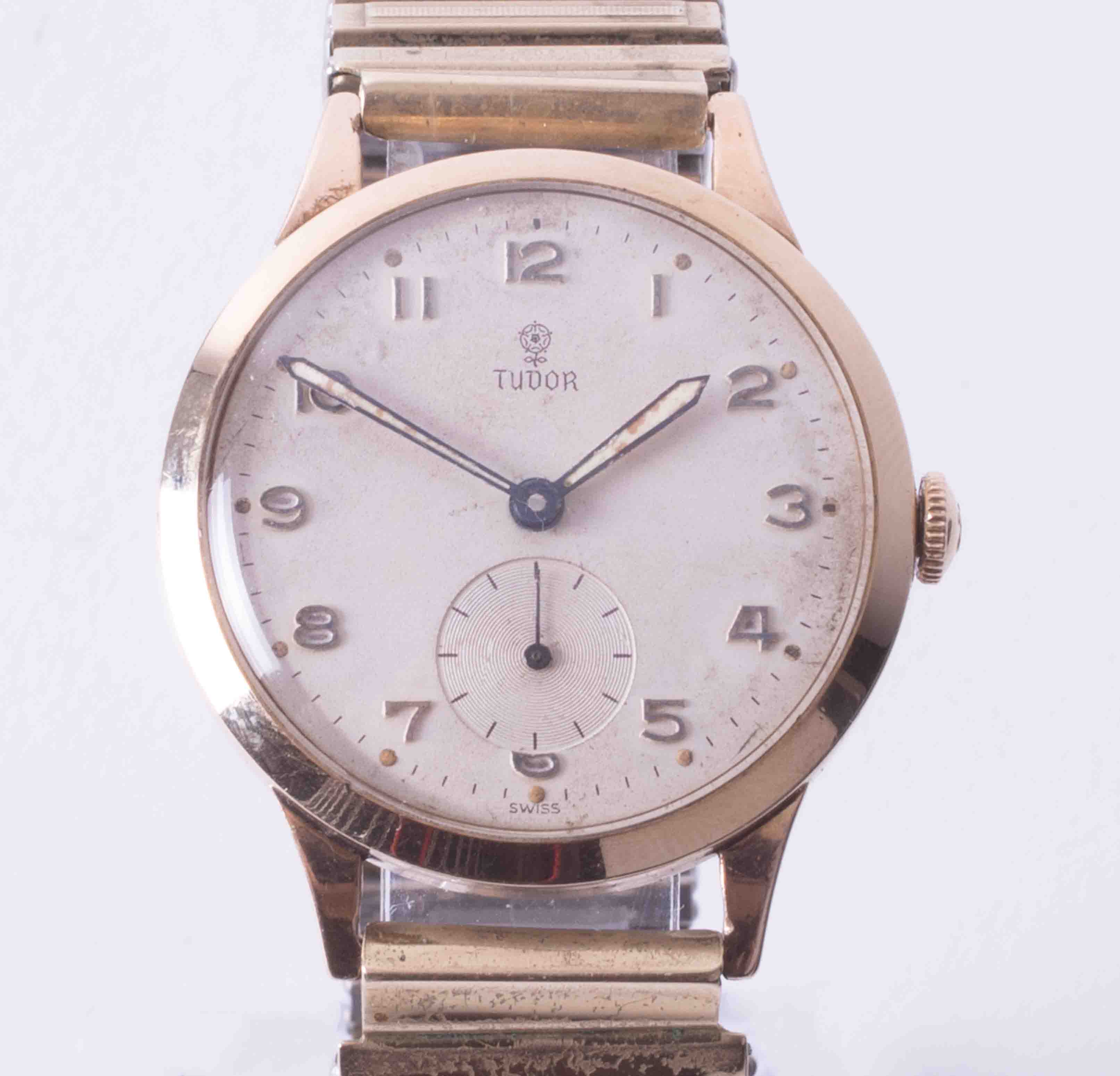 Tudor, a 9ct manual wind wristwatch circa 1965, the dial with Arabic numerals and sub-second dial,