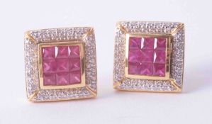 A pair of impressive 18ct yellow gold large square earrings set princess cut rubies and surrounded