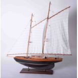 A model of a Racing Yacht on stand.