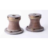 A pair of heavy ships metal capstans, height 14cm.