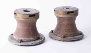 A pair of heavy ships metal capstans, height 14cm.