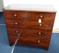 A Victorian mahogany chest fitted with two short and three long drawers on bracket feet, width