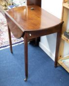 A 19th Century mahogany Pembroke table together with stained pine blanket chest (2).