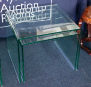 A nest of two modern Contemporary glass tables (2).